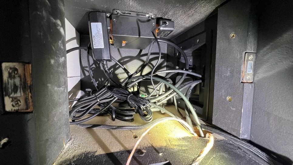 Concealed wiring and framing behind a fireplace TV install